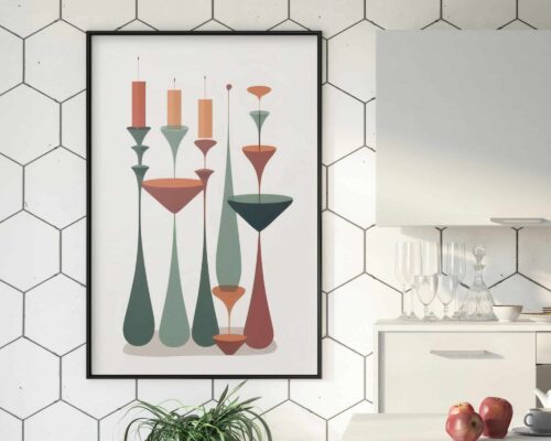 יצירת אמנות אבסטרקטית מודרנית ממוסגרת בשם 'תמונה למטבח ולפינת אוכל בעיצוב מופשט מודרני פמוטי נרות על רקע לבן' תלויה על קיר אריחים לבנים עם דוגמאות משושה. מתחתיו, ארון מטבח לבן מכיל כלי זכוכית ותפוחים שקופים בקערה, עם צמח על משטח סמוך.