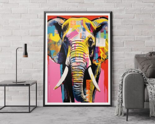 ציור פופ ארט תוסס וצבעוני של פיל על רקע ורוד, שכותרתו "תמונה לחדר נוער נוסח פופ ארט פיל צבעוני על רקע ורוד", מעטר קיר לבנים לבן. תמונה זו ממוסגרת בשחור ונשענת על הרצפה לצד שולחן שחור עכשווי עם מנורה, וכיסא מרופד אפור עם שמיכה עטופה מעליו.