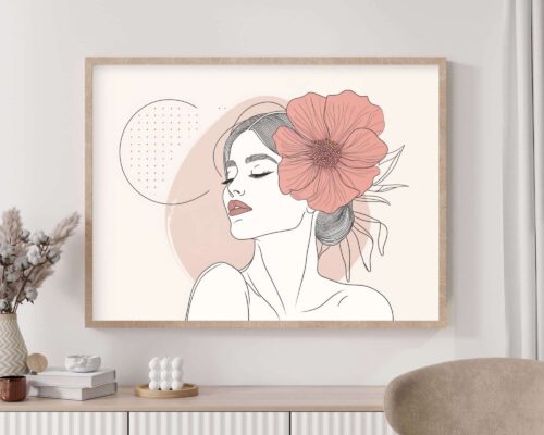 יצירת אמנות ממוסגרת בשם "תמונה מעל המיטה בעיצוב מינימליסטי אישה עם פרח ורוד", המתארת ציור קו מינימליסטי של אישה בעיניים עצומות, עונדת פרח ורוד גדול בשערה. הרקע כולל צורות ונקודות מופשטות. המסגרת מותקנת על קיר מעל ארון לבן המעוטר בפריטי נוי.